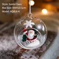 Christmas glass ball ornament featuring Santa Claus and tree inside with artificial snow - Santa Claus