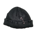 Black ribbed knit beanie with distressed hole details and silver metal pin accessory - Black