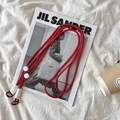 Adjustable red braided nylon crossbody bag strap with metal rings on white aesthetic background - Red Rope White Knot