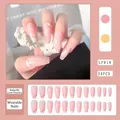 Detail showing pink gradient long coffin press-on nails with white rose and butterfly art - LF019 Pink Butterfly Flower Gold Dots