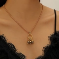 Vintage gouden schedelketting met drie schedelhangers in donkere gothic punkstijl - Antiek Goud en KC Goud (2819)