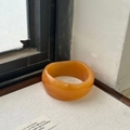 Wide translucent amber resin bangle with a polished finish and retro minimalist style - Amber Yellow