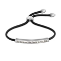 Close-up of engraved inspirational message on silver bar with black woven rope bracelet - Steel