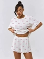Pigiama da donna bianco con fiocchi rosa, tessuto a costine e bordi arricciati - S / Fiocco