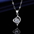 Silver plated necklace featuring round cut stone pendant and micro-pave diamonds - Xl-144 [with Four-leaf Clover Chain]