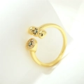 Anello aperto dorato a X con teschio in zircone blu e dettagli in cristallo blu - Stile Occhio del Diavolo Dorato con Zircone Blu (RG1031-A) / Aperto Regolabile