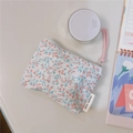 Detail of floral cotton coin purse with pink flower print and white zipper closure - Pink Small Floral