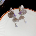 Detail of silver butterfly tassel earrings with purple wings and teardrop crystal pendants - Silver (Silver Pin)