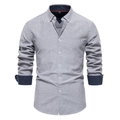Detail of light grey slim fit shirt with contrast navy blue collar and cuffs texture - Gray