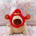 Cute capybara plush keychain wearing a red traditional hat with soft brown fur texture - God of Wealth Light Brown + Bead Chain