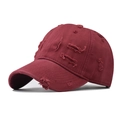 Detail of distressed ripped edges on a burgundy vintage washed cotton baseball cap - Adjustable / Distressed Wine Red