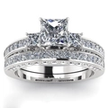 Prachtige bruidsringset in prinsesslijpsel van zilver met geometrische kanaaldiamanten - US 5 / Witgoud