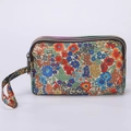 Three-layer floral canvas clutch purse with zipper compartments and a wrist strap - Abundant Flowers