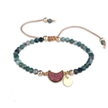 Adjustable woven bracelet featuring faceted green stones and a crescent moon charm - India Agate