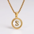 Detailed close-up of golden necklace featuring a letter S on a white shell pendant - Letter S