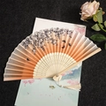 Chinese style folding fan with orange-pink gradient cherry blossoms and butterfly - Cherry Blossoms Falling - Light Color Handle