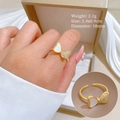 Detailed view of gold butterfly ring with shell inlay and cubic zirconia stones - Adjustable Open / Bowtie Shell Style (H406) / Gold (H406)