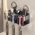 Wall-mounted dark gray toothbrush holder with suction cups and 3 rinse cups - Family of 3 · 3 Colored Cups