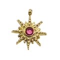 Detail of 14k gold star pendant featuring a pink zircon and textured metal finish - Rose Red Zircon