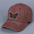 Detail of red vintage denim baseball cap featuring butterfly patch and Free flight embroidery - Burgundy / M (56-58cm)