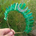 Detail of handmade emerald crystal wicca crown with silver moon on gold metal headband - Dark Green + White K Moon