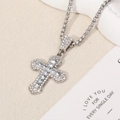Silver hip-hop cross necklace with clear zircon stones on a minimalist cream background - Cross / Silver Chain with White Pendant