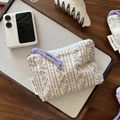 Detailed shot of a floral cotton mini pouch with zipper and simple wish label - Purple Coffee Striped Floral Cutout