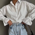 White cotton shirt with dot texture and lace cuffs worn with light blue jeans - S / White