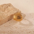 Polished golden shell ring with radial texture and granular details for women - Gold Shell Shape Ring