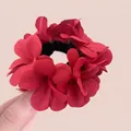 Elegant red silk flower scrunchie hair tie for women featuring a layered petal design - Red Hibiscus Scrunchie