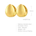 Macro shot of 18K gold teardrop earrings with matte finish and vacuum plating detail - Teardrop / Gold
