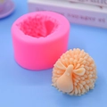 Detail of pink silicone sheep mold showing intricate texture and finished craft candle - Closed Eyes Side Lying Sheep Style (3)