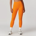 Bright orange high-waisted seamless yoga leggings with scrunch butt lifting effect - Persimmon Orange