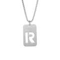 Detail of silver titanium pendant with brushed metal texture and cutout letter R design - Letter R