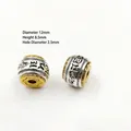 Tibetan silver cylinder spacer beads with gold trim and engraved mantras for jewelry - E-1 Silver Mantra
