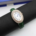 Detail of oval diamond bezel watch with green crocodile strap and Roman numerals - Green Roman Dial