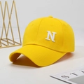 Bright yellow cotton baseball cap with white embroidered N letter in minimalist style - Adjustable / Yellow