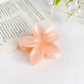 Pinza para el pelo con forma de flor melocotón y un acabado translúcido brillante - Naranja