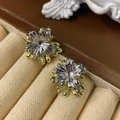 Detailed close-up of leaf-shaped pearl earrings with gold and silver plating texture - E5913 Silver Pin-Main Color (Stitched Flower)