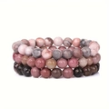 Set aus drei 8mm Naturstein-Armbändern mit Tigerauge und Türkis auf weißem Hintergrund - Nr. 1 Rhodonit/Grautöne/Brauntöne