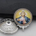 Detail showing Orthodox icon medallion with Jesus Pantocrator and silver ornate metalwork - Silver-8 (Jesus Christ Pantocrator)