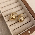 Minimalist elegant gold spherical hoop earrings presented inside a luxury wooden jewelry box. - Smooth Gold Ball Hoop (57#)