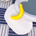 Funny yellow banana hair clip with glossy finish for parties and unique hairstyles - Banana