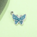 Ciondolo a farfalla argentato con strass blu per collane e bracciali fai-da-te - Farfalla Blu Lago Placcata Argento UV