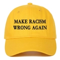 Detail of Make Racism Wrong Again embroidery on yellow cotton baseball cap with ventilation eyes - Yellow / Adjustable