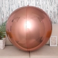 Spherical 4D rose gold aluminum foil balloon placed on a beige sofa for party decor - 4D Sphere Rose Gold / 32 inch