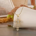 Gold-plated cross pendant necklace with sparkling cubic zirconia on ball chain - Style 23902-Radiant Hollow