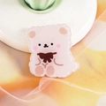 Cute pink acrylic cartoon bear pin with brown bow tie on soft decorative fabric - 15 Cute Bear