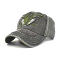 Close-up of vintage dark grey washed cotton baseball cap with green bull skull embroidery - M (56-58cm) / Army Green