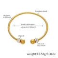 Detail of snake-textured gold stainless steel open bangle with crystal spheres - Z012-Snake Texture with Ball / Gold